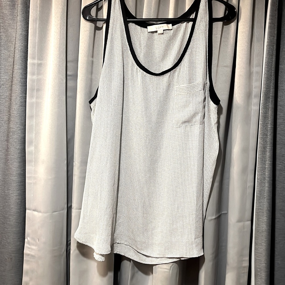 Used great condition, large Loft sleeveless blouse with pocket.
